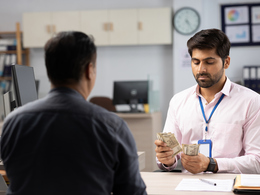 Boss paying employee in cash