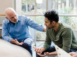 Two colleagues having serious conversation