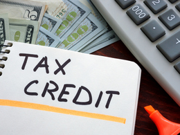 Cash Calculator Tax Credit Note in Notebook